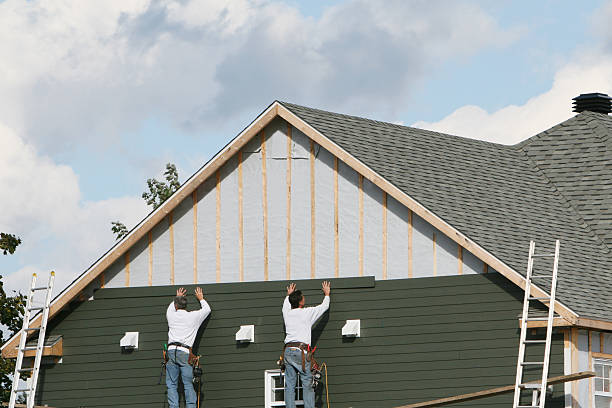 Professional Siding technician working in Howell, NJ